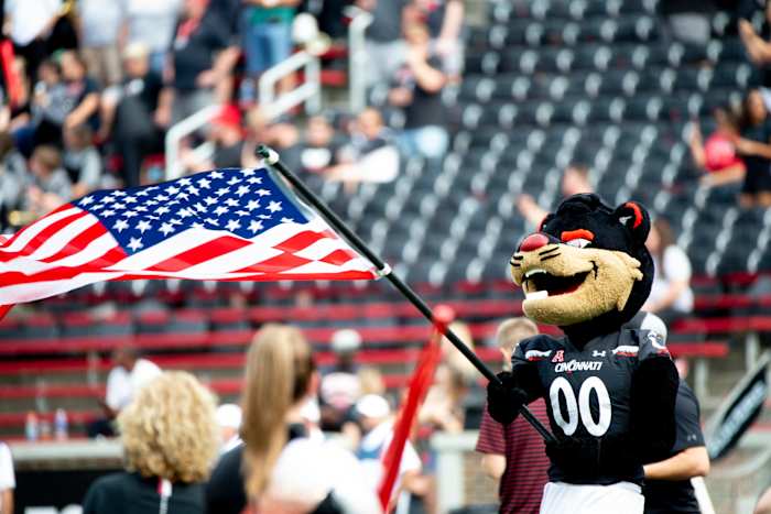 Cincinnati Bearcats mascot holds a flag before the NCAA football game between Cincinnati Bearcats and Murray State Racers on Saturday, Sept. 11, 2021, at Nippert Stadium in Cincinnati. Murray State Racers At Cincinnati Bearcats